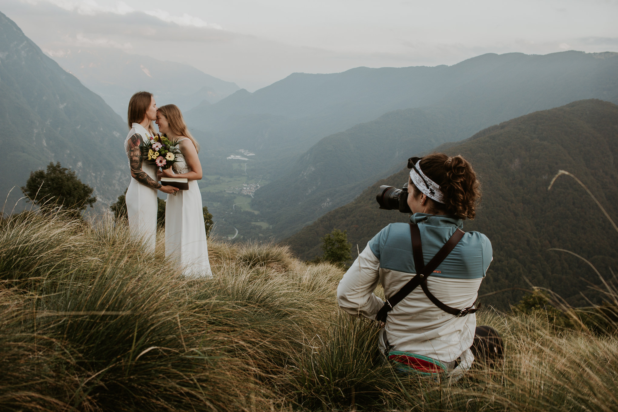 Slovenia elopement photographer photographs a couple kissing during their elopement day in the Slovenian Alps