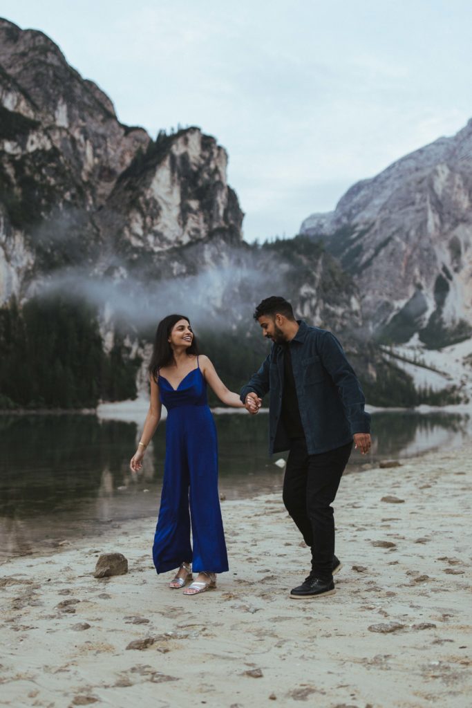 couple gets engaged at Lago di Braies in the Dolomites