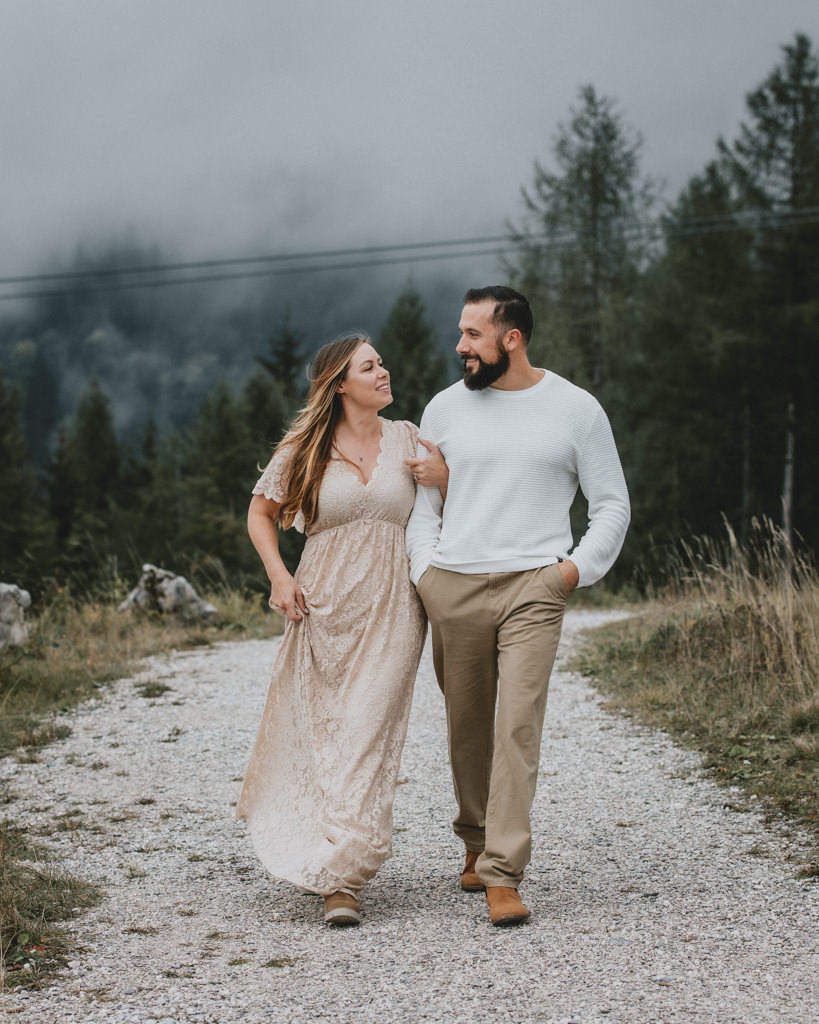 Couple walks near Jenneralm during their October vow renewal in Berchtesgaden, Germany