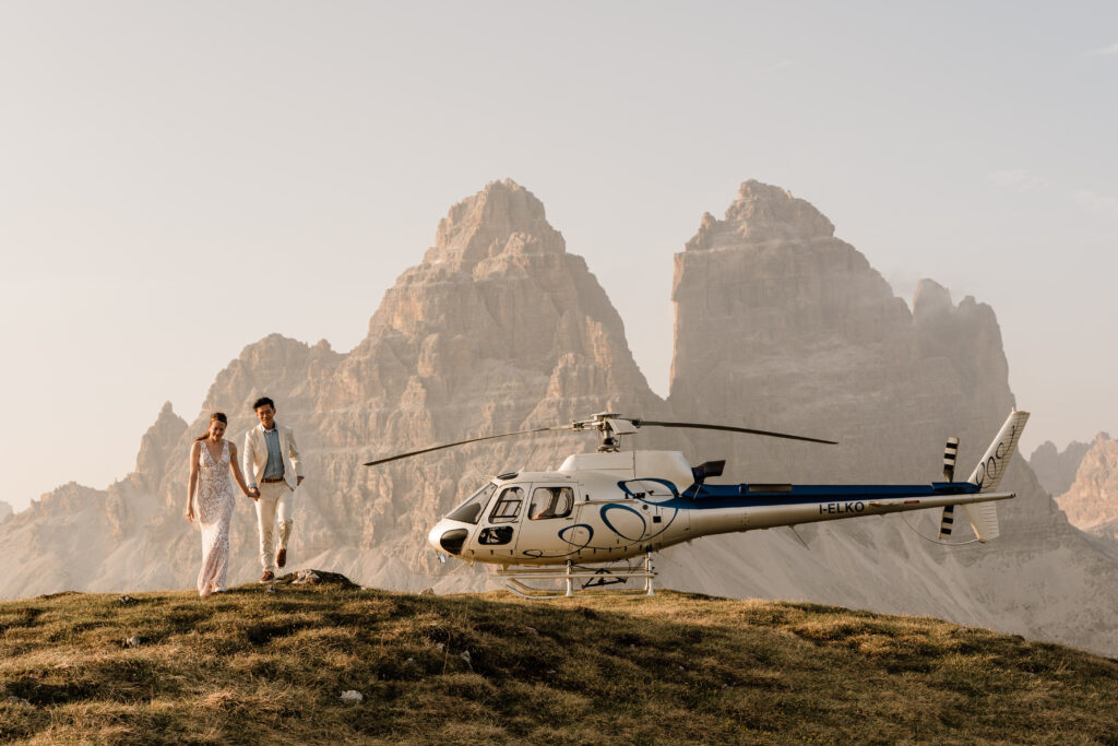 Private helicopter summit overlook Dolomites proposal and picnic setup